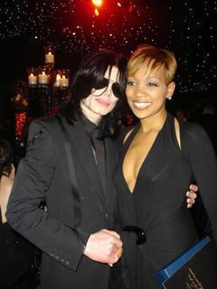MICHAEL JACKSON WITH SINGER MONICA ARNOLD AT A BIRTHDAY PARTY 2007