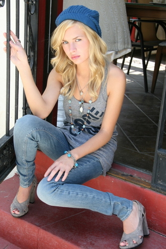  Britt Robertson as Cassie