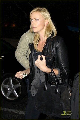 Charlize Theron Dines With A Mystery Male