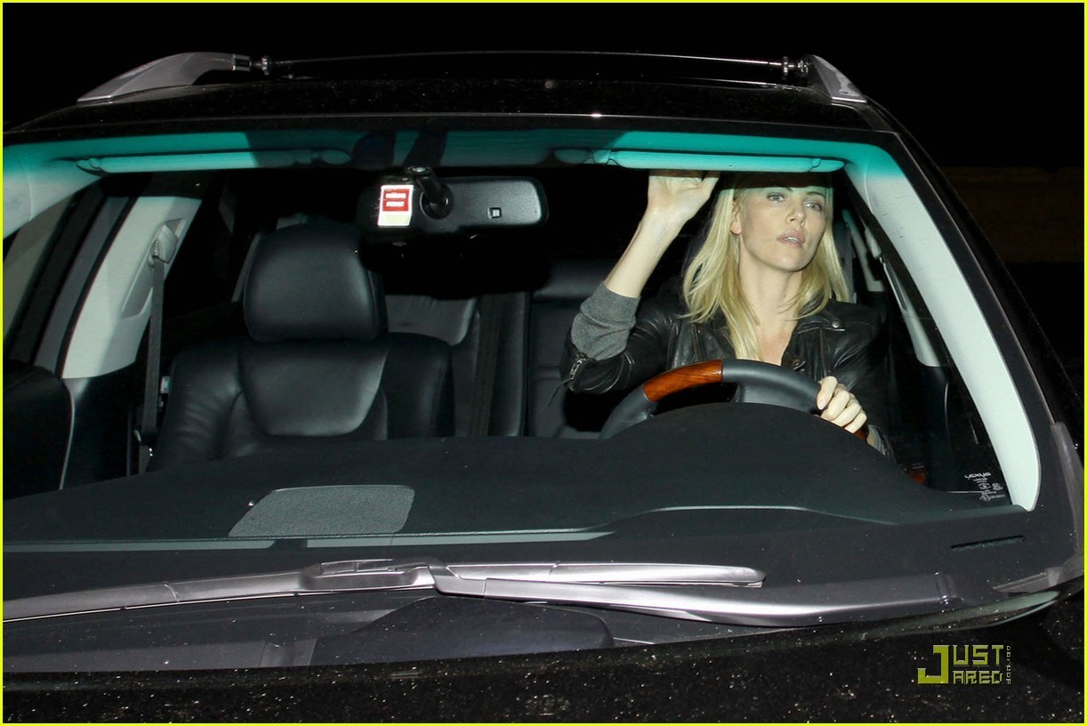 Charlize Theron Dines With A Mystery Male