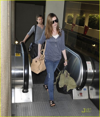 Anne Hathaway & Adam Shulman Jet Out of LAX