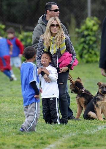March 30: Taking her kids and dogs to a park