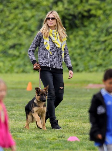  March 30: Taking her kids and Hunde to a park