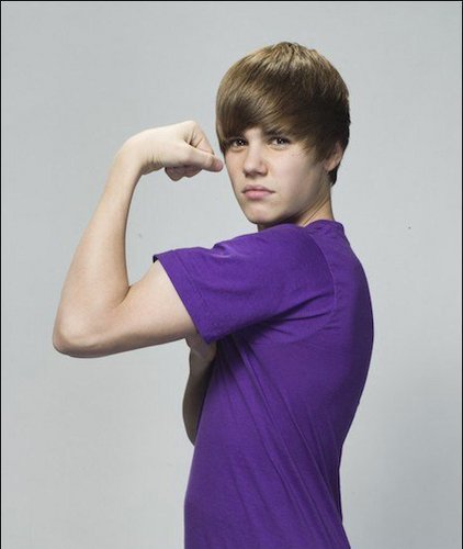  Bieber flexing his muscles