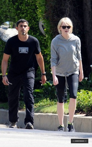  Emma Stone Jogging With Trainer in Los Angeles on 04/22 Candids