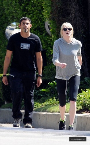 Emma Stone Jogging With Trainer in Los Angeles on 04/22 Candids