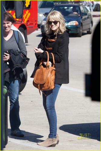  Emma Stone Takes Flight at LAX