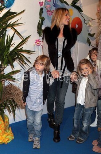 Ilary Blasi and her sons Christian (L) and Chanel (R) attend 'Rio' premiere at Cinema