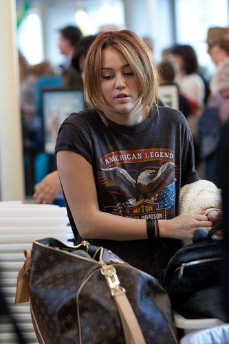  Miley - At LAX Airport (27th April 2011)