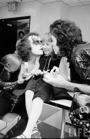 Gene and Paul give a kiss