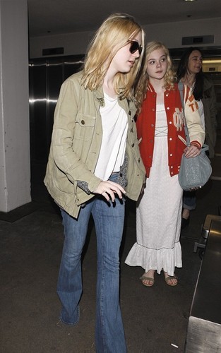  Dakota and Elle Fanning arriving at LAX Airport (May 3).