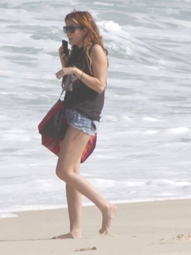  Miley - On a beach, pwani in Rio de Janeiro, Brazil (12th May 2011)