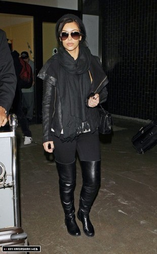 Kim is photographed in New City before arriving at LAX airport 3/28/11