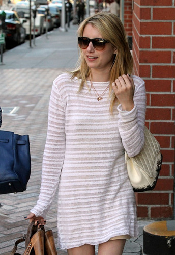  Emma Roberts gets a manicure and pedicure with a friend.