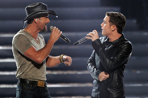 Scotty and Tim McGraw singing "Live Like You Were Dying" during the finale