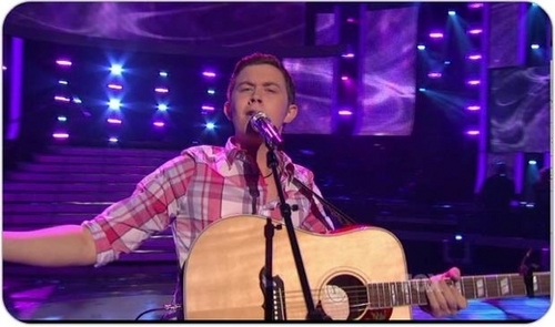 Scotty sings "Check Yes of No" door George Strait in the finale