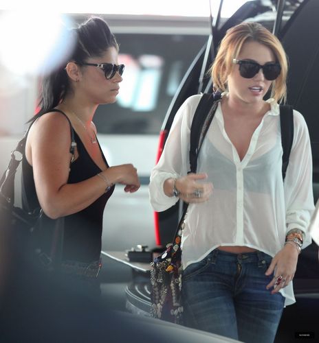  Miley - At the Airport in Mexico - May 27, 2011
