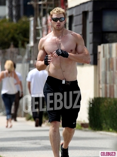  A shirtless and sweaty Kellen Lutz takes a run along the strand in Santa Monica.