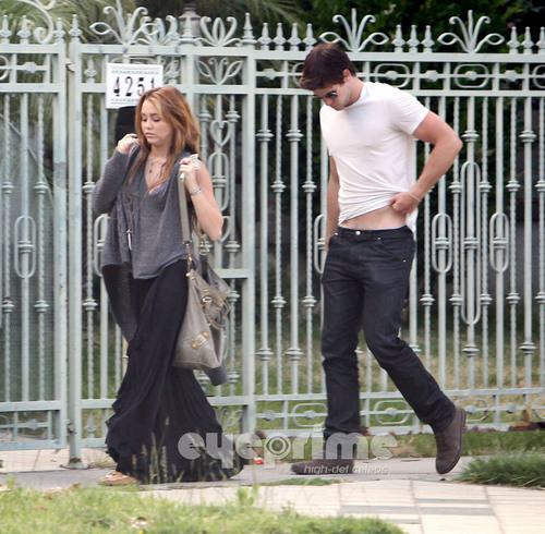  Miley Cyrus and Liam Hemsworth were spotted outside Liam’s house
