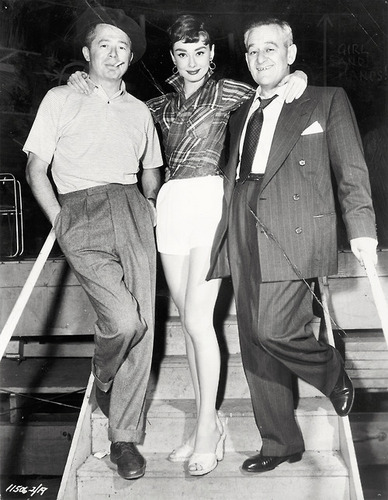  1954, during the filming of Sabrina: Audrey and director Bill Wilder and William Holden