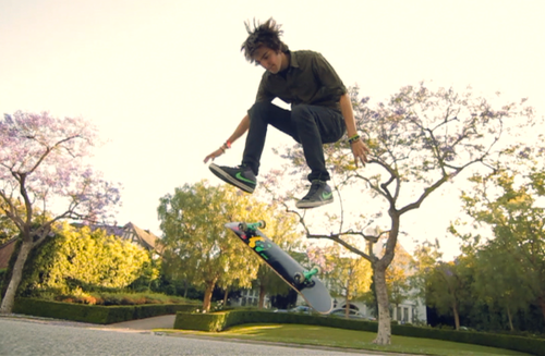  Dave riding a skatebord for his 'Who Says' vid