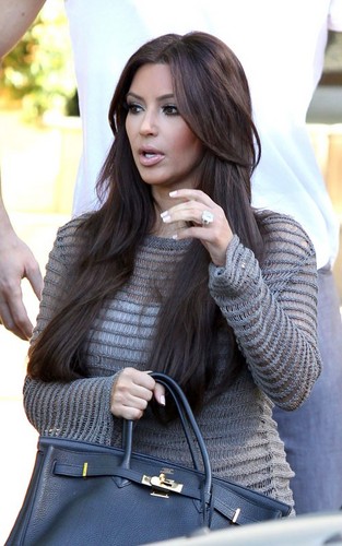  Kim Kardashian leaving her homein Los Angeles (July 1).