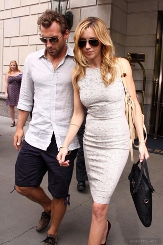  Leaving her New York hotel with Jarret (June 29) - еще фото