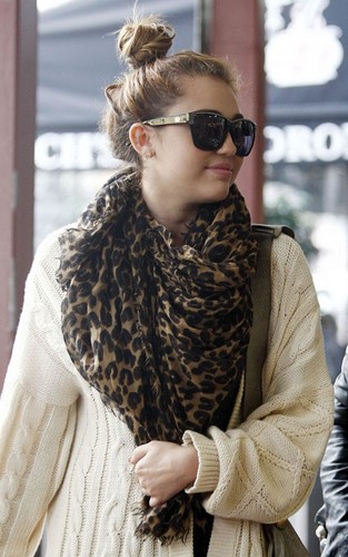  Miley Cyrus leaving the Witches Cauldronin Perth (July 1).
