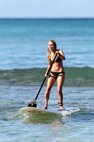  AnnaSophia paddle surfing in Hawaii, Jul 4