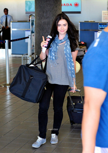  Lily Collins departs LAX, July 4