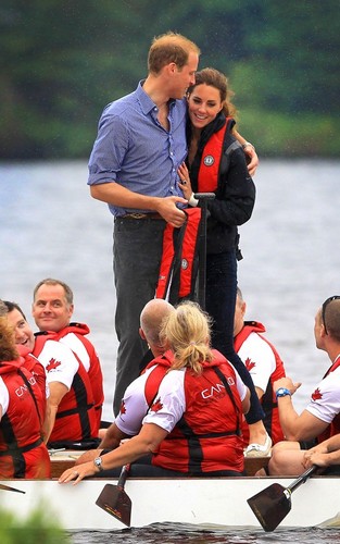  Prince William and Kate Middleton competing in a dragon bangka race (July 4).