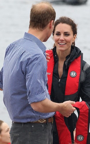  Prince William and Kate Middleton competing in a dragon bateau race (July 4).