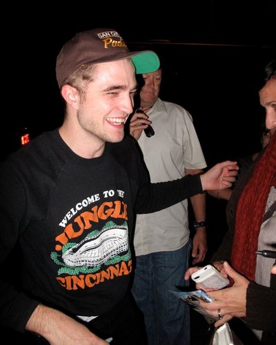rob with fans in set cosmopolis