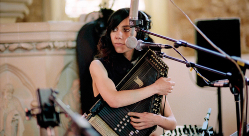  PJ Harvey Approaching the Mic for a Live Performance at New York's Terminal 5