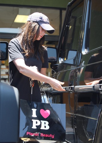Megan Fox does some shopping and leaves with a rather large bag from Planet Beauty.
