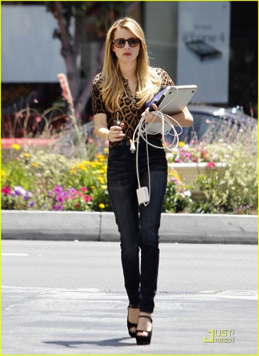  Emma Roberts carries her laptop back to her car in West Hollywood, Calif.