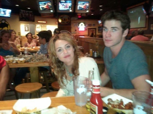 Miley - With Liam at Buffalo Wild Wings in Michigan - July 17, 2011