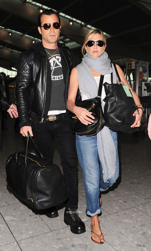  Jennifer Aniston and Justin Theroux departing London, July 21