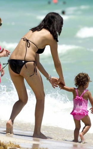 Adriana Lima and her daughter Valentina Jaric in Miami, FL (July 24).