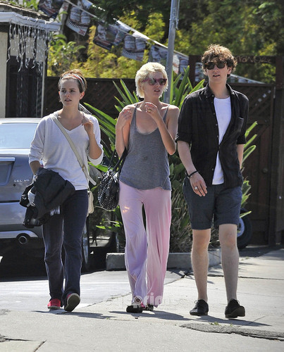 Emma Watson heads to a movie with friends in Santa Monica