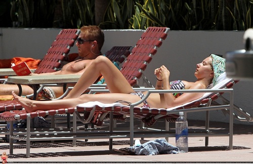  Ashley -Relaxing poolside at her hotel in Miami - July 31, 2011