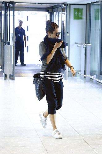  Mila Kunis departs Heathrow Airport in London, Aug 4