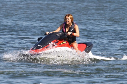  Miley - Enjoys a relaxing hari with Friends in Orchard Lake, MI - July 31, 2011