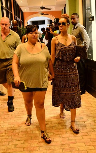Rihanna spotted shopping with family and friends in Barbados (July 31).