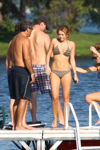  Miley Cyrus With फ्रेंड्स In Orchard Lake,MI - 31. July