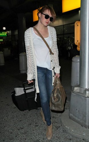  Emma Stone arriving at JFK airport in NYC (August 10).
